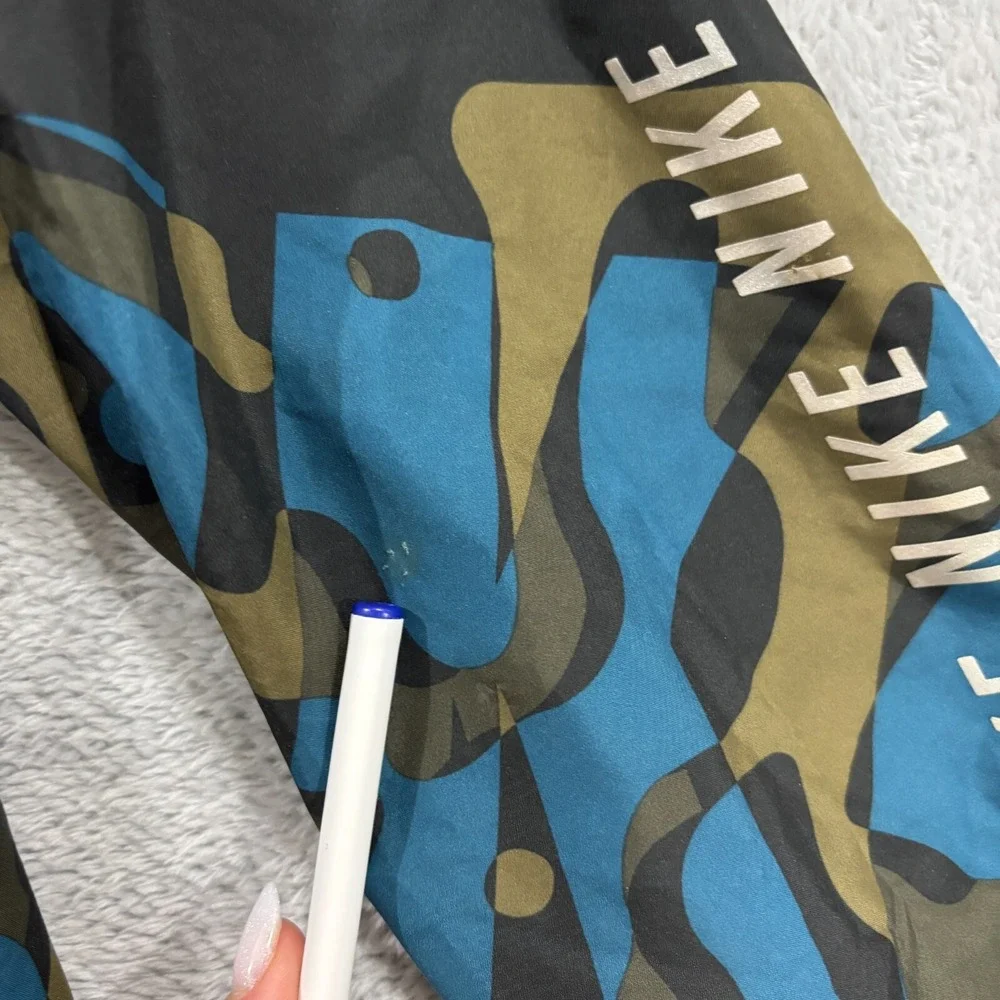 NIKE Running‎ Essentials Jacket Men M Green Blue Camo Reflective Print Hooded
